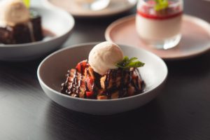 Mini Churros w cinnamon sugar, strawberries, chocolate
sauce drizzle & vanilla ice cream at Edge Geelong Restaurant and Bar